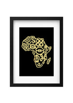 Framed artwork of a stylized map of Africa in gold on a black background