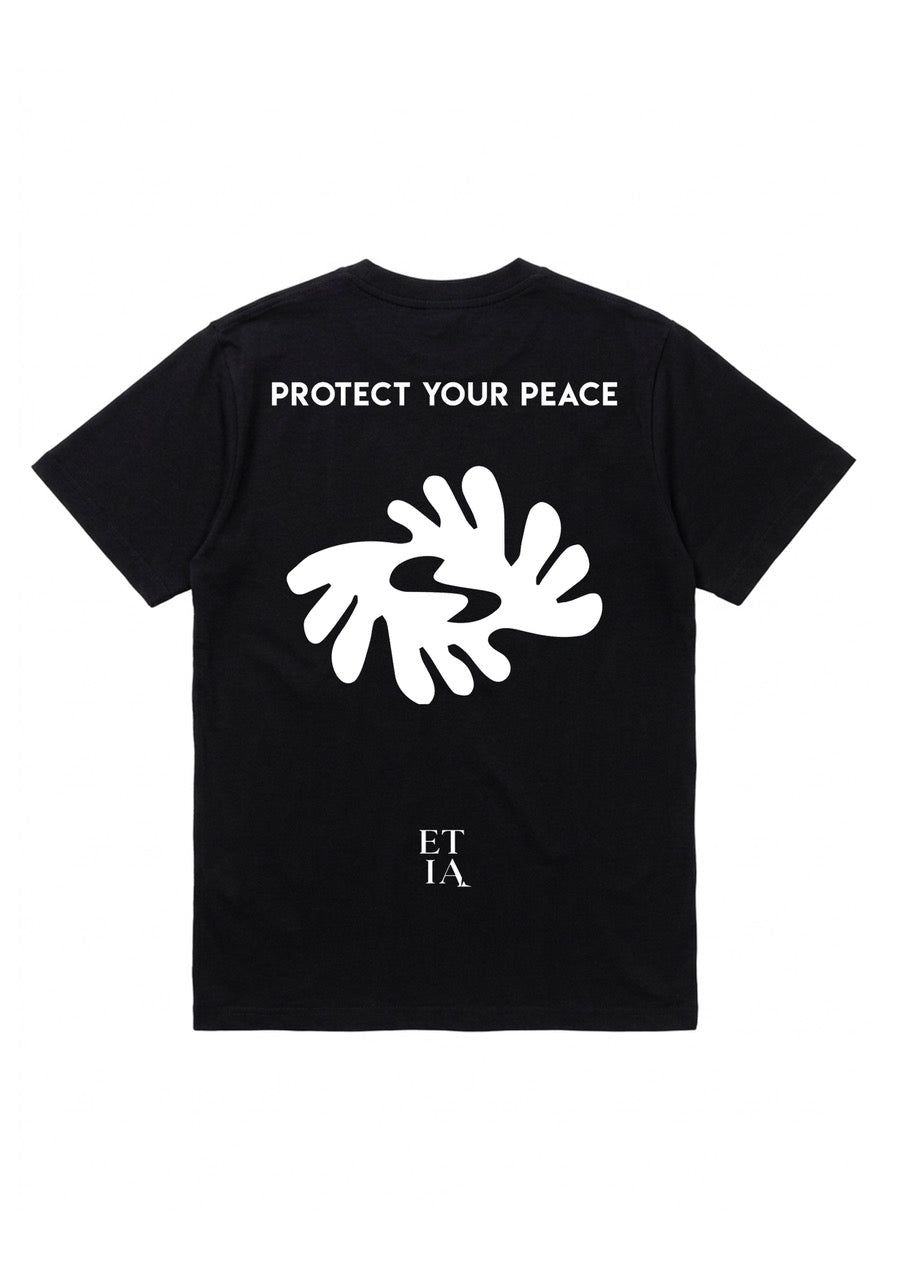 Black t-shirt with white text and design on a white background