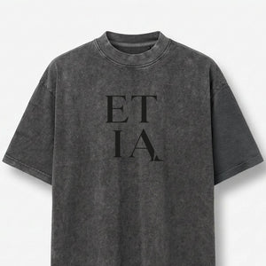 Gray t-shirt with 'ETIA' text on a white background