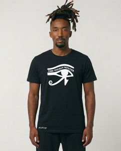 Man wearing a black t-shirt with a white symbol and text on a plain background