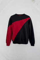 Black and red sweater on a white background