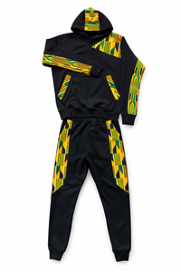 Black and yellow patterned tracksuit on a white background