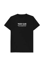 A white cotton T-shirt with the text 'WABI-SABI beauty and acceptance is in imperfection' printed on the front.