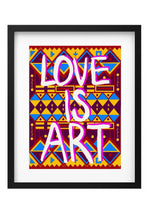 Framed artwork with 'LOVE IS ART' text on a colorful geometric pattern
